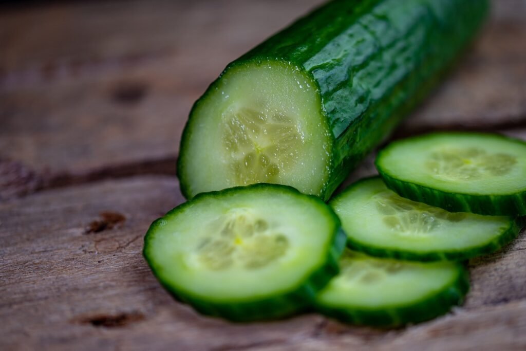 cucumber, cucumber slice, cutting board